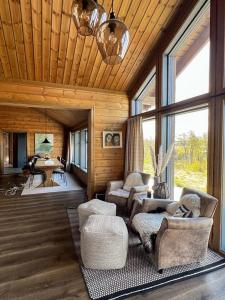 Χώρος καθιστικού στο Mountain Cabin With Hardangervidda View