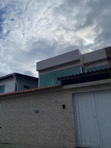 a building on top of a building with a sky at Casa - Candeias- Jaboatão dos Guararapes in Recife