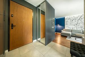 Ένα ή περισσότερα κρεβάτια σε δωμάτιο στο Konstelacja Gwiazd Apartament