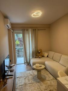 Χώρος καθιστικού στο Aurora Apartament