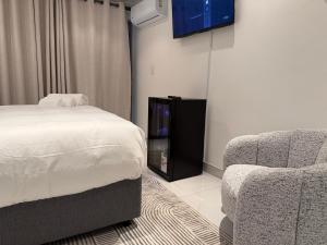 Μια τηλεόραση ή/και κέντρο ψυχαγωγίας στο Cherrywood Guest House