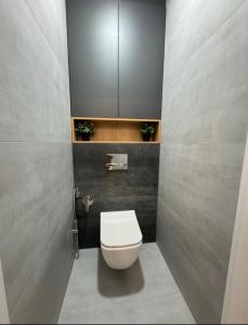 Ένα μπάνιο στο Apartment Modern Chișinău