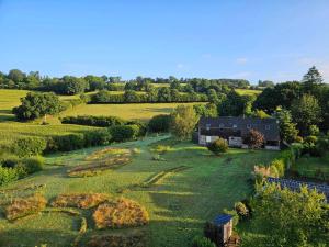 an aerial view of a farm with a barn at Maison Sérénité et Nature près du Mont Saint Michel in Braffais