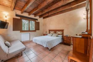 Postel nebo postele na pokoji v ubytování El Molino de la Pastora