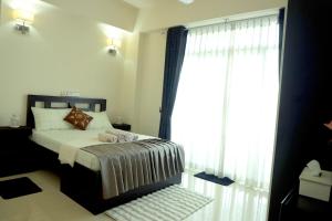 Postel nebo postele na pokoji v ubytování Apartment in Dehiwala - Mount Lavinia, Sri Lanka + 20 fotografií