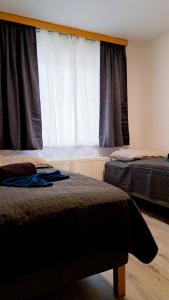 Postel nebo postele na pokoji v ubytování revLIVING Lodge Kleinstelzendorf Hollabrunn - 4 Schlafzimmer