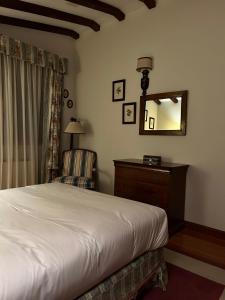 Postel nebo postele na pokoji v ubytování Casa ARRUIZ + 5 fotografií