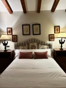 Postel nebo postele na pokoji v ubytování Casa ARRUIZ