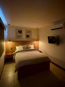 Ένα ή περισσότερα κρεβάτια σε δωμάτιο στο Palmas de Tamarindo Resort, 304E +23 φωτογραφίες