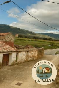 a sign for anacienda la ballasi in front of a building at La Balsa in Matalebreras