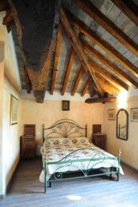 Un pat sau paturi într-o cameră la Corte Pioppazza
