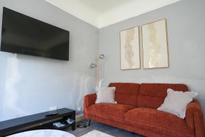 TV a/nebo společenská místnost v ubytování Alexandra House