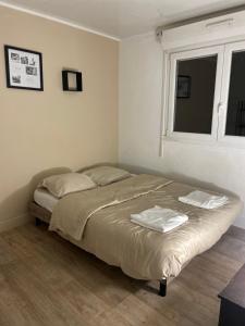 Postel nebo postele na pokoji v ubytování Appartement 2 chambres lumineux à 10 minutes de Paris