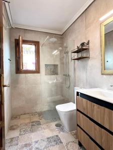 a bathroom with a toilet and a sink and a shower at Marisol Apartment Vera Playa Andalusia 150 m from the Beach, Spain in Vera +41 photos