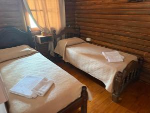 Postel nebo postele na pokoji v ubytování Posada del Sol Monte + 14 fotografií