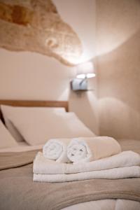 Postel nebo postele na pokoji v ubytování Archi di Puglia