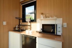 Η κουζίνα ή μικρή κουζίνα στο Kirisawabase Tiny House by Tiny Away +15 φωτογραφίες