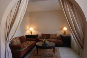 A seating area at Hotel Chellah