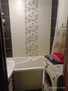 Koupelna v ubytování Східний мікрорайон апартаменти + 9 fotografií