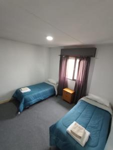 Postel nebo postele na pokoji v ubytování Don Jenaro