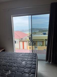 Gallery image of Casa com vista para o mar e perto do centro in Imbituba +9 photos