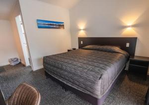 Postel nebo postele na pokoji v ubytování Recreation Hotel