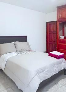 Postel nebo postele na pokoji v ubytování Villa Boquete