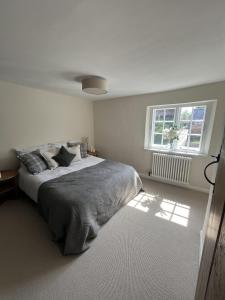 Postel nebo postele na pokoji v ubytování The Old Forge + 9 fotografií