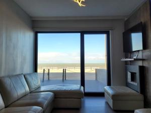 Istumisnurk majutusasutuses Seafront apartment with terrace on Zeedijk