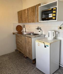 Nhà bếp/bếp nhỏ tại Asoma Madryn +2 ảnh