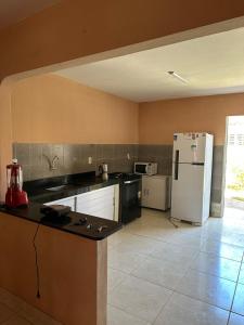 Køkken eller tekøkken på Casa com vista para farol do Parracho