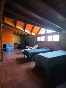 Postel nebo postele na pokoji v ubytování Cabañas Lodge Angirú + 33 fotografií