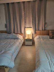 Postel nebo postele na pokoji v ubytování Hongdae ssuny house