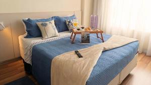 Una cama o camas en una habitación de Hotel Aeroporto Stay Here 22 fotos más