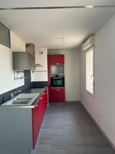 Kuchyň nebo kuchyňský kout v ubytování T4 Récent - Fonsorbes Centre avec 2 parkings