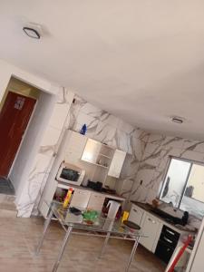 Kuchyň nebo kuchyňský kout v ubytování Chácara silva