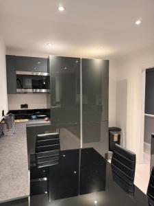 Η κουζίνα ή μικρή κουζίνα στο The Moon B&B