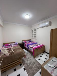 Postel nebo postele na pokoji v ubytování Sea View three bed room High Floor fully AC free WI-FI and parking for familes and same gender group only