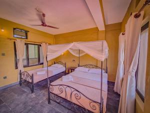 Ένα ή περισσότερα κρεβάτια σε δωμάτιο στο Babai Outback Adventures PVT LTD