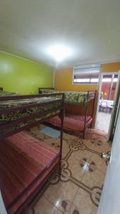 Postel nebo postele na pokoji v ubytování Hospedaje con Pensión Completa