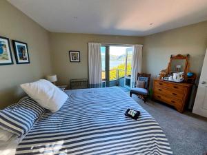 Postel nebo postele na pokoji v ubytování Diamond Harbour Lodge