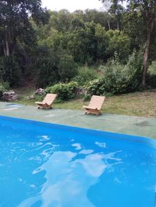 Bazén v ubytování Hosteria Calamuchita nebo v jeho okolí