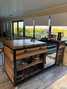 Kuchyň nebo kuchyňský kout v ubytování Quinta Los Pinos Paraná