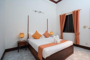 Ένα ή περισσότερα κρεβάτια σε δωμάτιο στο Banhja Villa with Private Pool