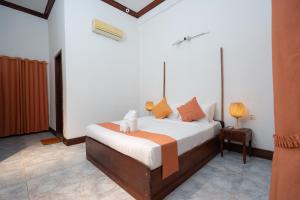 Ένα ή περισσότερα κρεβάτια σε δωμάτιο στο Banhja Villa with Private Pool