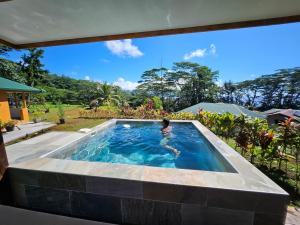 Imagen de la galería de Revatua Lodge - Piscine privée et petit-déjeuner inclus, en Pueu