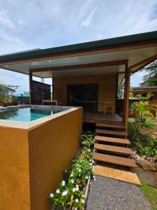 Imagen de la galería de Revatua Lodge - Piscine privée et petit-déjeuner inclus, en Pueu