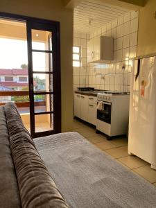 Kuchyň nebo kuchyňský kout v ubytování Pousada Nova