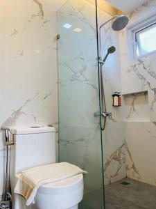 Koupelna v ubytování Luxebridge Hotel + 14 fotografií