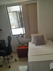 Postel nebo postele na pokoji v ubytování Habitación cerca Sena-Uis + 3 fotografie